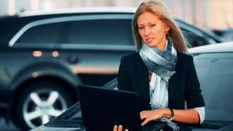 Woman At Car Dealer