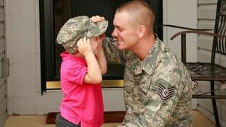 Military Man With Child