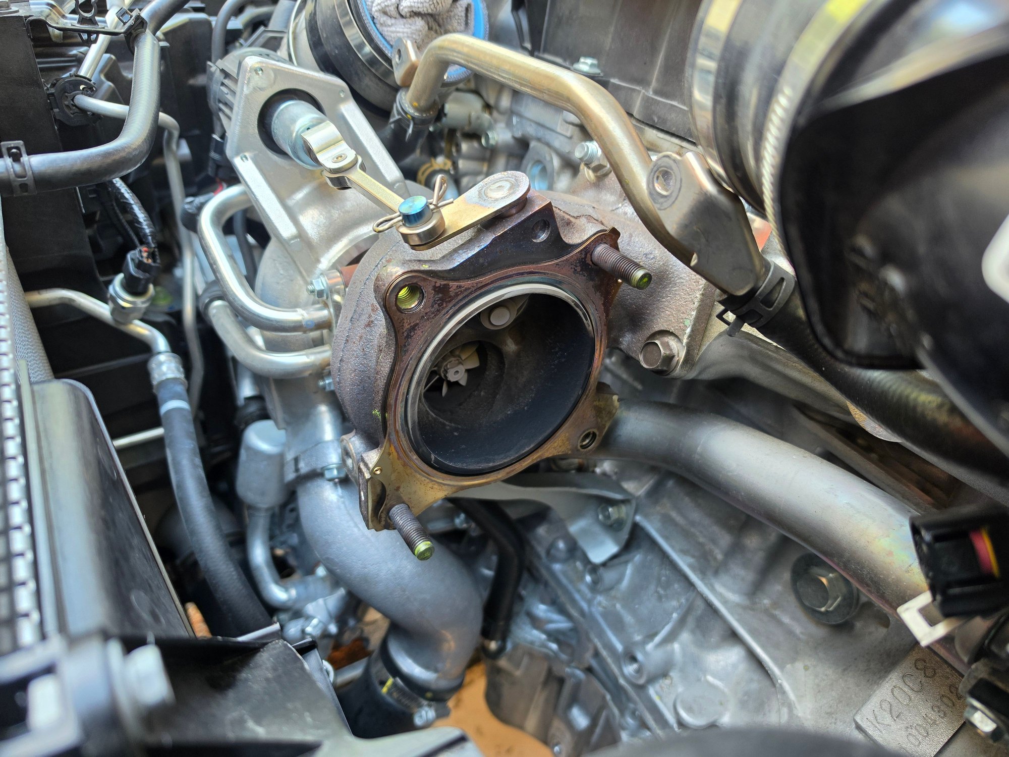 Down pipe removed. I was fortunate enough to not have any issues removing the bolts after using lubricant and crayons on the bolt treads.... Phew!  