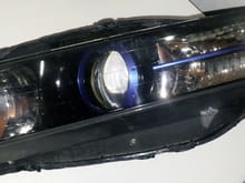 Headlights from Bruce came in today... Blacked out, blue ring and strip, Amber removed, carbon fiber sides, ZKWR lens