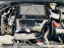 Engine bay, with the painted oem cover, ets intercooler, k&n intake, & some hidden parts as well. 