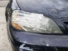 seller sent a spare headlight in trunk. it was broke on inside, but had good lense.