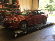 The car was originally equipped with these OEM Acura accessory 15 spoke chrome rims. These rims are not mounted on the car now, but are included with the car seperately.  