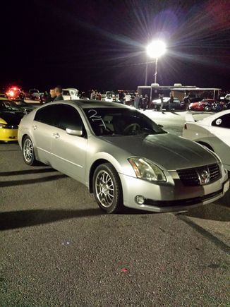 that's my friends  maxima waiting for a third run vs an evo x