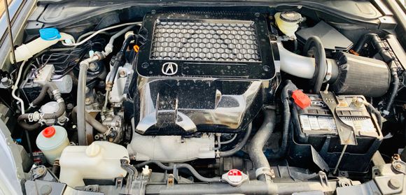 Engine bay, with the painted oem cover, ets intercooler, k&n intake, & some hidden parts as well. 