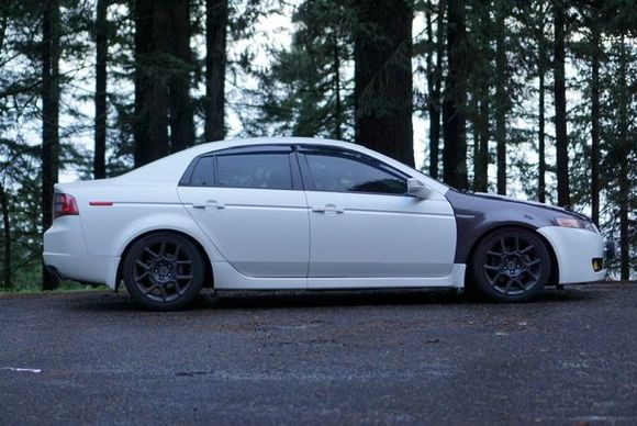 Eventually I was involved in a hit and run... my driver side fender was damaged and there was paint damage on my front bumper.

I ended up deciding to go with the endlessrpm carbon fiber fenders and decided to get my front bumper repainted.