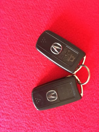 Two OEM Acura key fobs.  Key fob #2 never used.