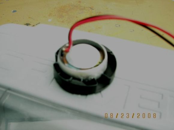Modified factory tweeter cover and glued momo silk tweeter to the underside of the grille.