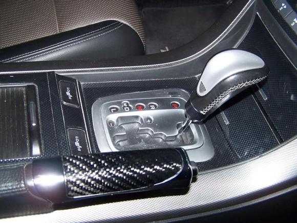 Carbon Fiber emergency brake cover.