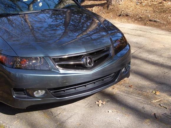 Shaddow chrome grill and tinted headlights.