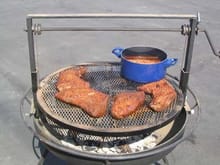 For the FBK Guys. Tri-tips on the grill. The BBQ is a California Firepit. 30&quot; diameter 1/4&quot; steel bowl. Made for wood. Burning Kingsford with hickory                                         