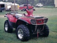 Here's a pic of my 2003 P650 right before one of my local XC races (this one held in Jacksonville, TX).  NOTICE: 25&quot; Bearclaws mounted on C-series