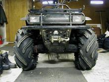 Tri-Claws are mounted on stock 6.5" wide rims. 6.5" rims make the tires narrow enough to fit up front.