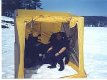My 2001 kodiak 400 , fishing for trout in a tent I built for my bike ayear and a half before Arctic Cats model thats out now