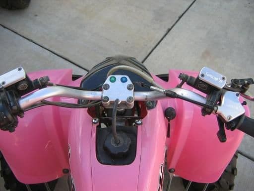 Aluminum Brake master cylinder covers, throttle cover and handle bar mount on the Jetmoto 125.