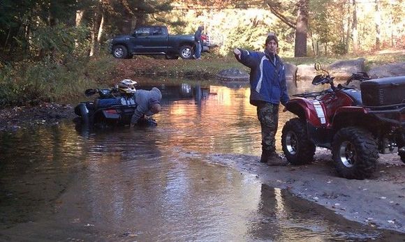 troy winching beergut stuck on his honda rincon