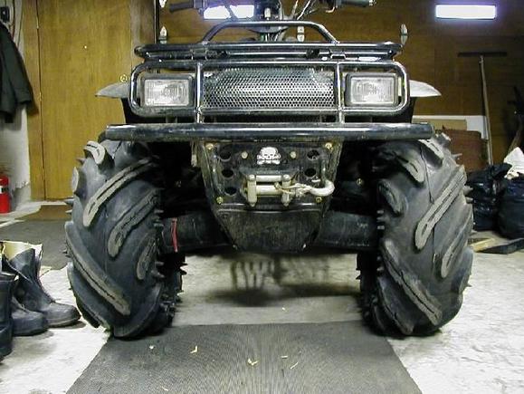 Tri-Claws are mounted on stock 6.5" wide rims. 6.5" rims make the tires narrow enough to fit up front.