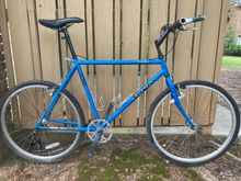 As it currently sits after adding brakes and replacing the fugly bars and stem it came with.