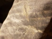 Separation in the casing threads at the tear.