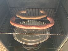 In the smoker with a pan of water and mesquite chips.
