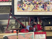 There is a frame hiding behind Raleigh, Columbus and Clement hats 