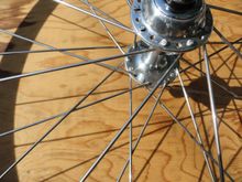 The non-drive side of the rim and the current installed spokes.