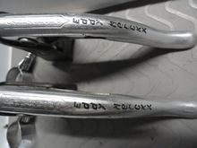 There are a few scuffs in the levers but are not deep and show some wear of road duty as would be suspected in an older set of levers.  