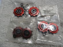 The cleared ones are pretty new looking and seem fine.  The bottom set are pretty worn but may be of some use.  The tag is the correct number for bearing replacements.