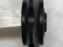 Bushing slides into pulley but binds when we get to the oversized end portion.