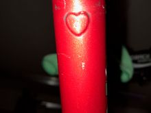 Heart-shaped protrusion under the downtube to stop the shifter levers from slipping