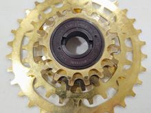 $50: ProCompe with NOS Sprockets and Body, 14-16-18-24-32. Excellent condition. (5 speed)