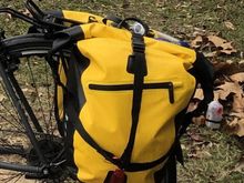 I generally have one I carry into the office and the other has repair items.  I ride with just one on frequently with no issues. Adequate attachment points for supplemental lights.