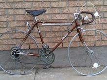 No tires as had no spares in 27 inch, will cut all cables to size after I have the tires on a derailleurs adjusted