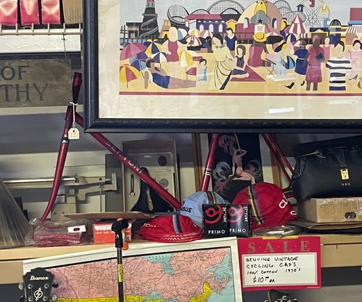 There is a frame hiding behind Raleigh, Columbus and Clement hats 