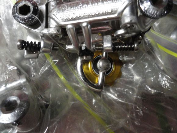 Refurbished NR rear derailleur with new stainless adjuster bolts and sealed pulleys.