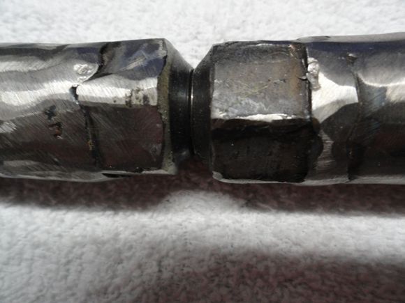 Note that the nuts make a perfect contact so no slippage can occur.