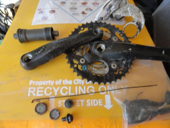A triple crank with sealed bb.   A take off from a mountain bike.  Also a weird FD for oversize tubing that clamps through the BB.