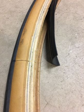found this between tube and tire. quite thick and around whole circumference