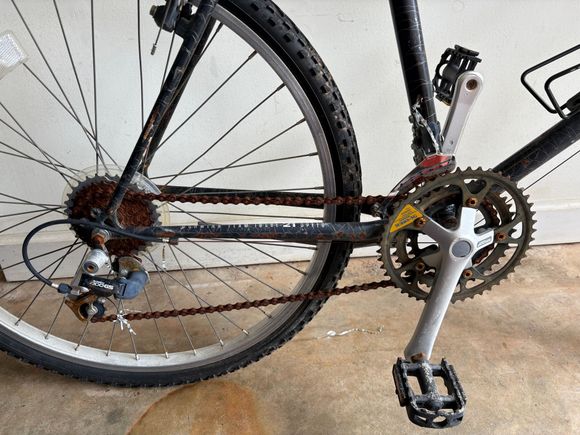 The chain is rusted solid and will be cut off