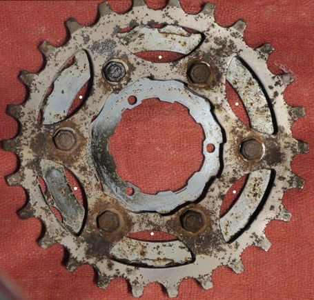 Bottom side.  Note winter corrosion.  White dots in both photos show the visual checks for alignment.