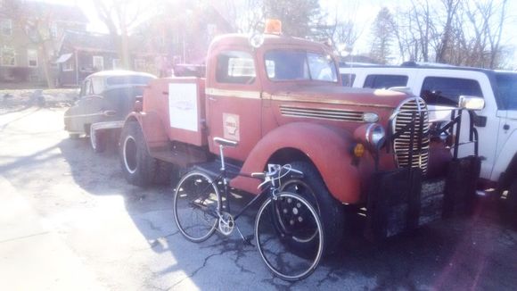 Old iron. 1966 Schwinn racer fixed gear, 38 Ford wrecker wuth a 50s Packard on the hook