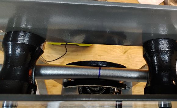 Test bars mounted in the bender.  These were the original Dahon bars which I've never liked. 