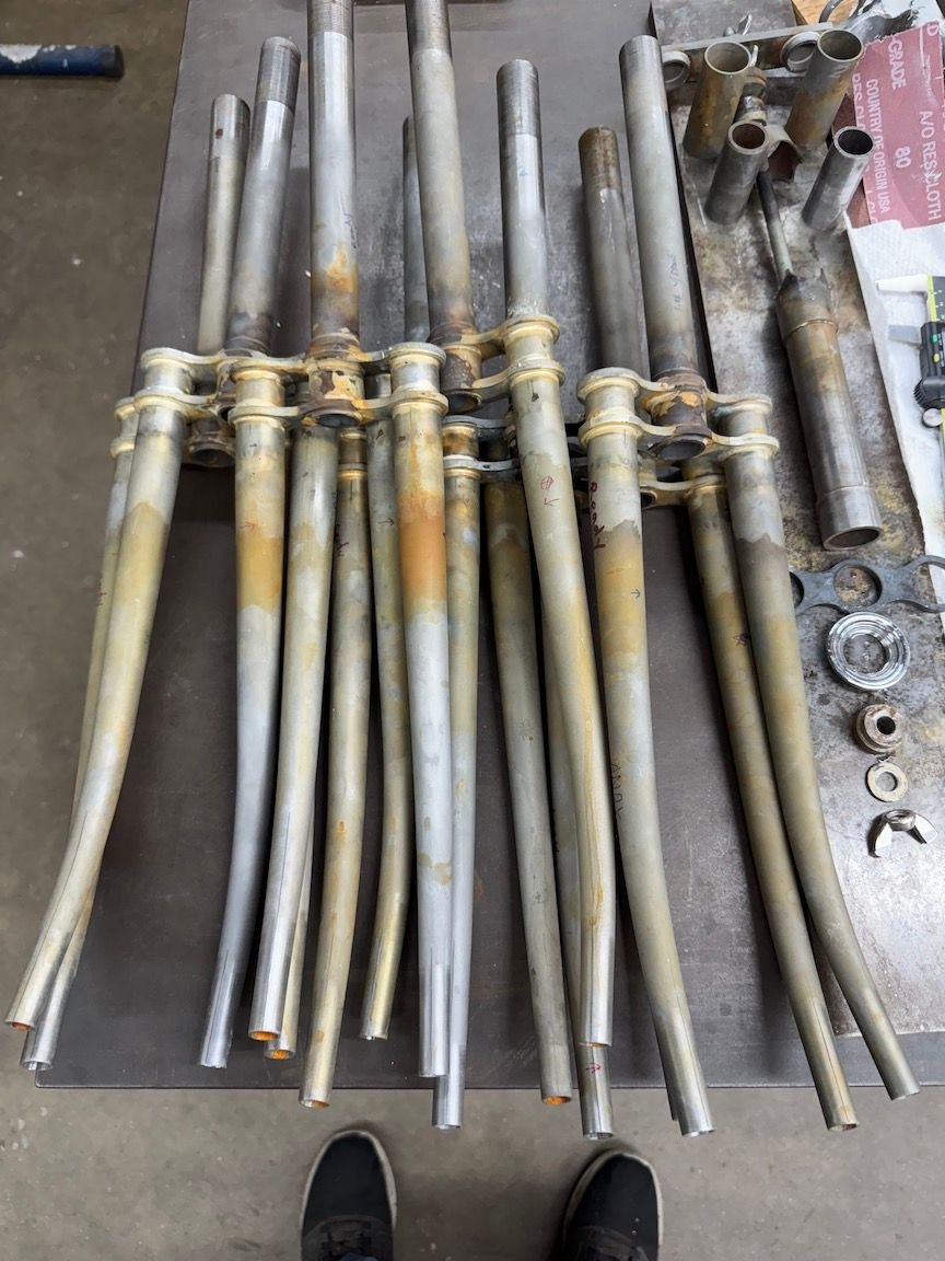 The guys will take them back to their shop and braze in the dropouts and the cross decorations