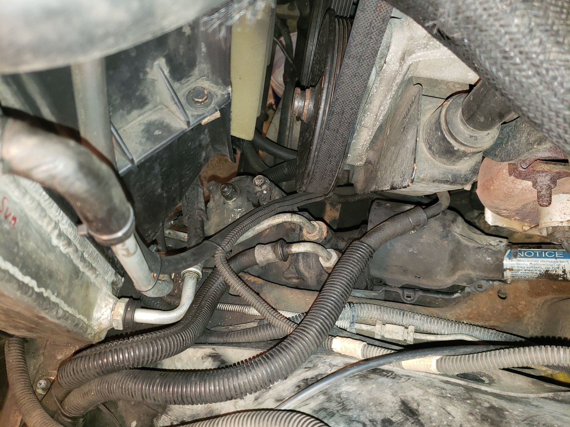 view from above showing the old steering gear and the hose routing.