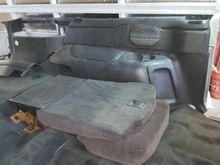 plastic blazer panels fit nicely in the back. fold down seats installed. rear air box on pass side