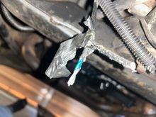 Possible transfer case wiring or something leading towards the rear of the vehicle