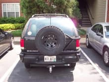 spare tire, hitch and cb antenna