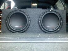 2 12in bassinfurno 1500 watt 700rms each with a boss 1200w amp and a 550f compsitor