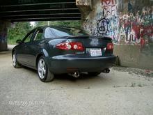 2005 Mazda 6 custom race exhaust, chrome diamond plate floor mats with chrome grenade shifter knob