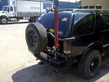 spare tire carrier all finished with cb whip and hi lift jack installed